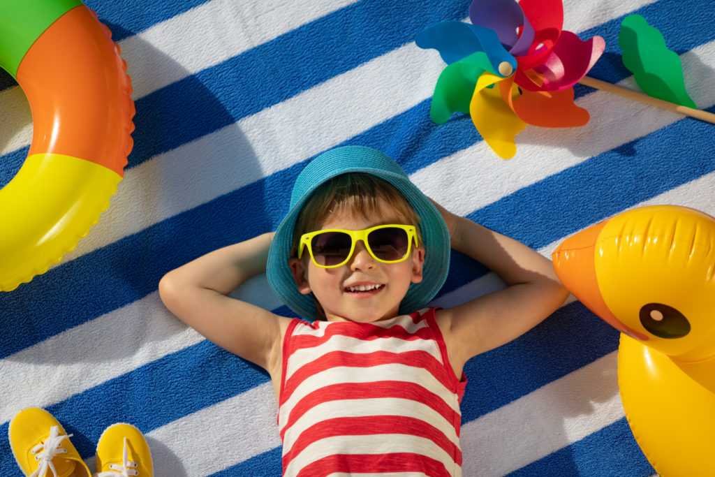 child enjoying the summer Creekside Dental