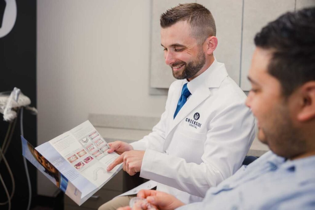 patient having an initial consult with Dr. Bennett of Creekside Dental