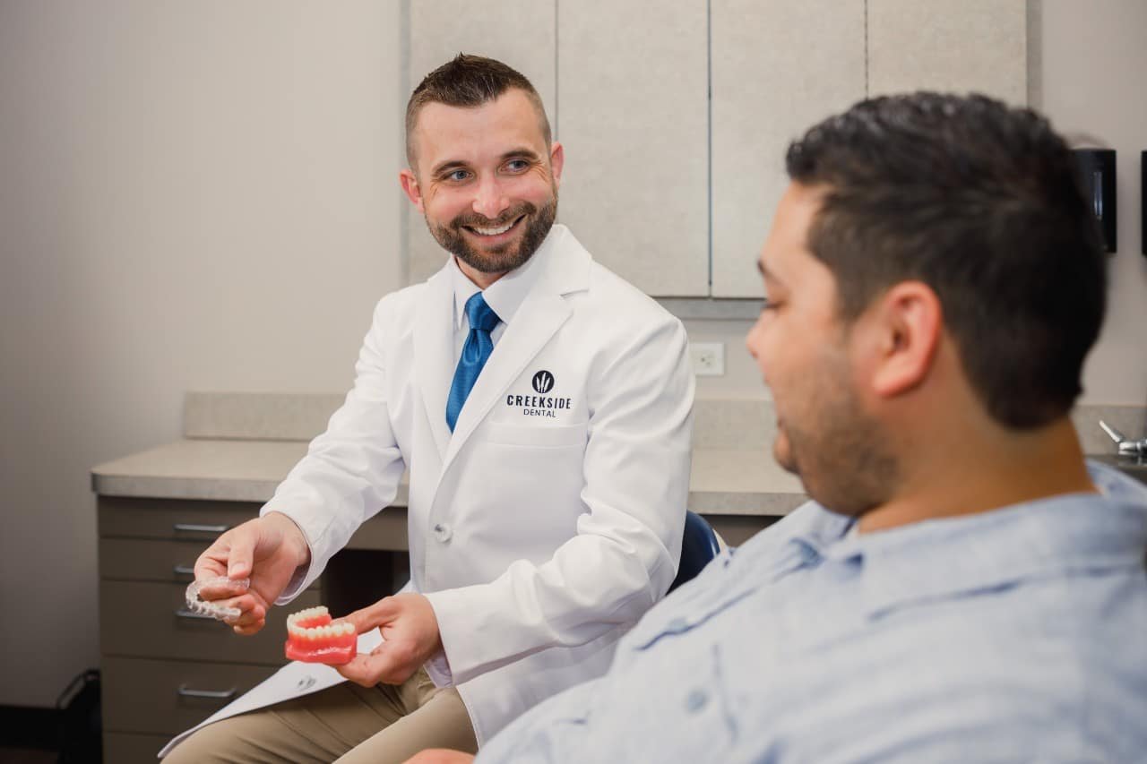 Invisalign aligners initial consultation at Creekside Dental
